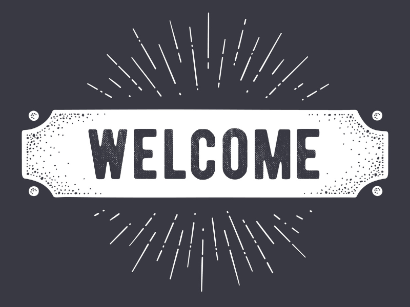 Welcome sign with burst.