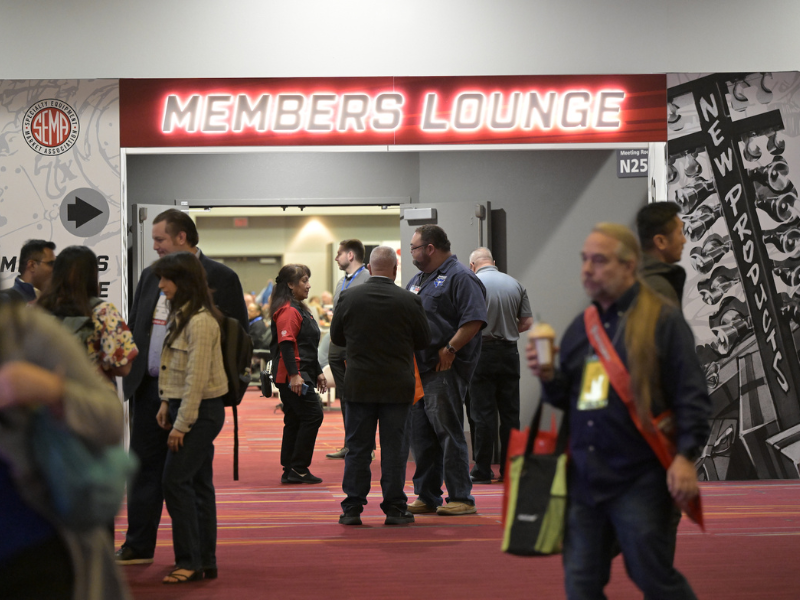 Member&#039;s Lounge entrance with people coming and going