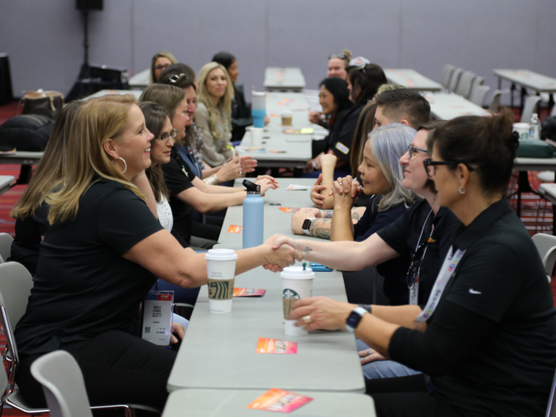 People participating in a speed networking event