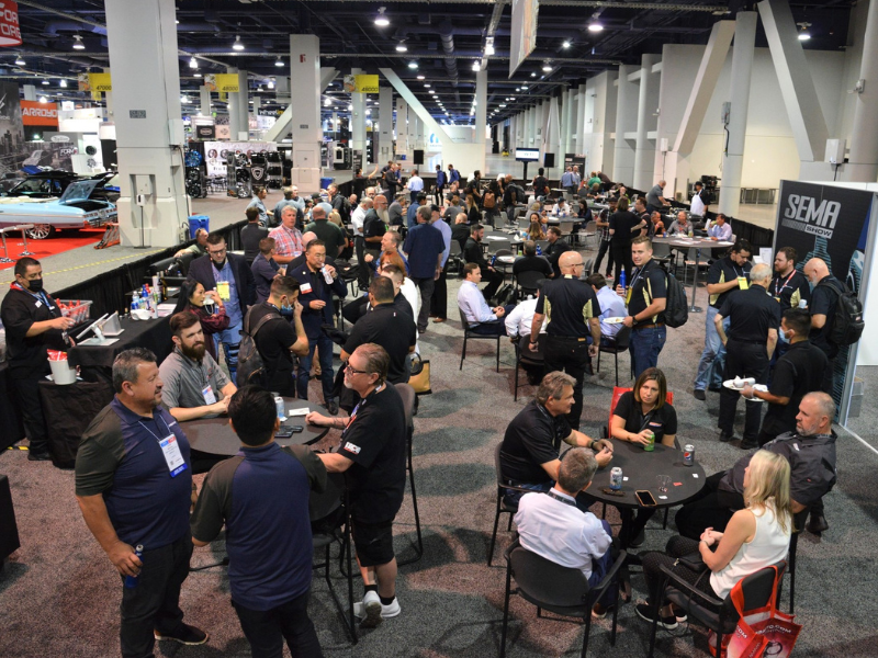 Groups of people having conversations at a reception