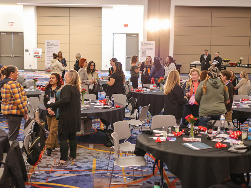 People in different small groups socializing at SBN event