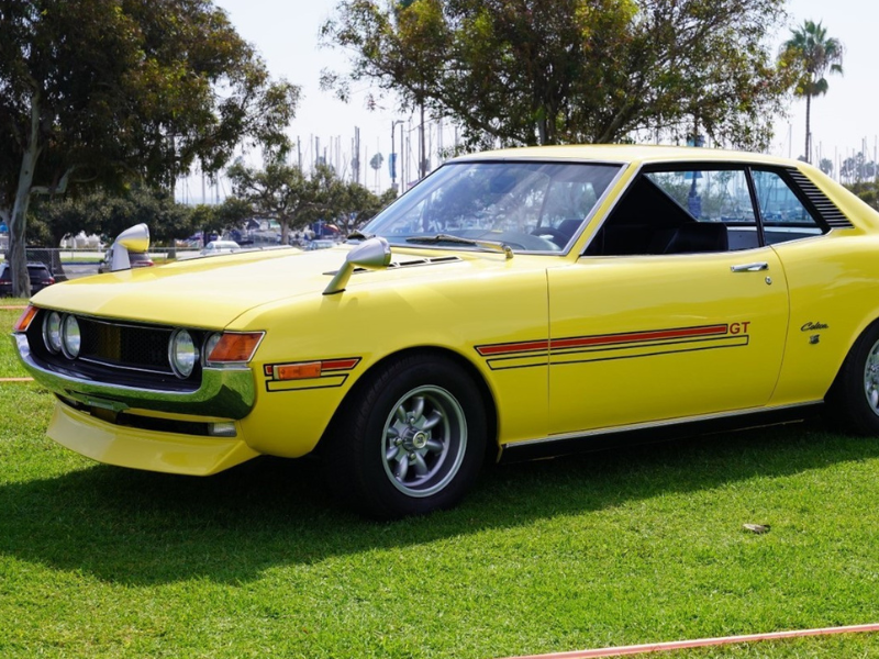 Yellow Datsun coupe